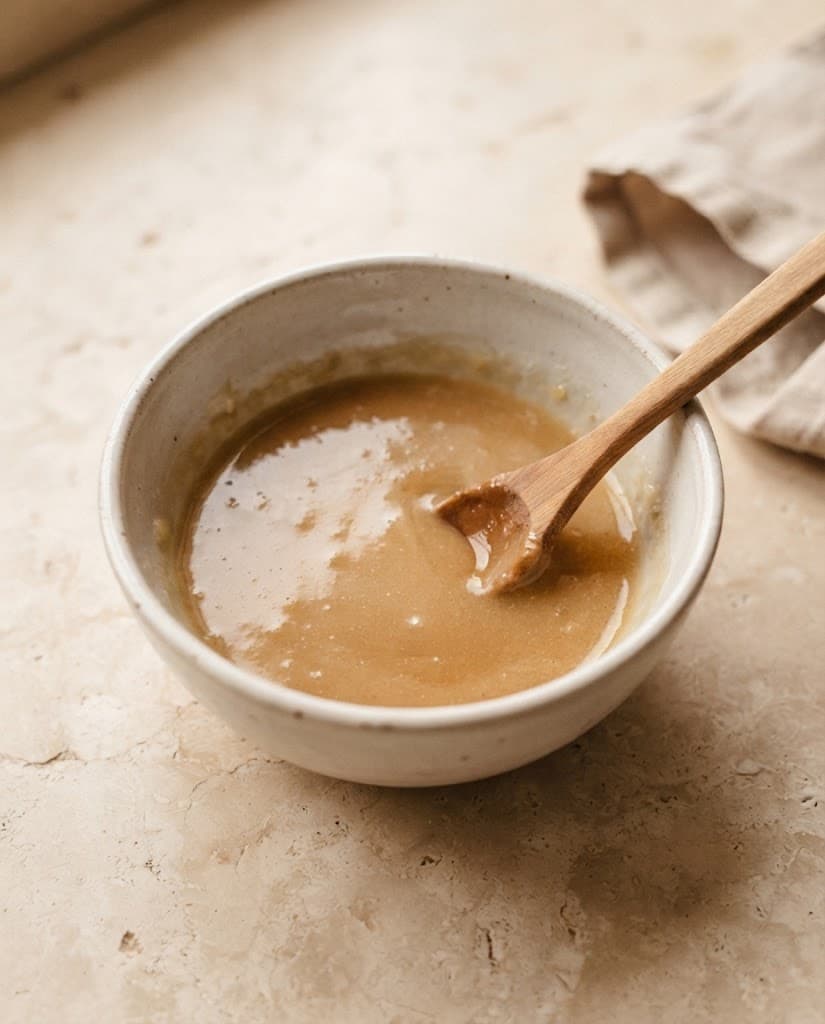 Smooth butter and sugar mixture after adding milk and vanilla extract